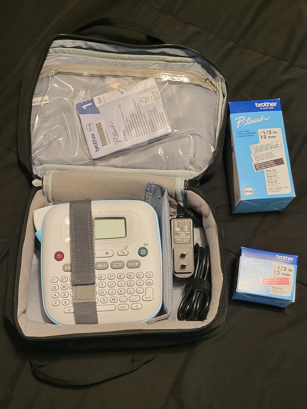 Brother P-touch Label Maker in White and Light Blue with Accessories